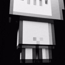 a black and white image of a cube with the letters tm on it
