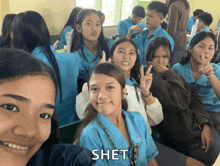 a group of girls are posing for a picture with the word shet on the bottom right