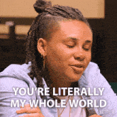 a woman with dreadlocks says " you 're literally my whole world " in a netflix ad