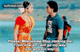 a man and a woman are standing next to each other and the woman is asking the man to stop stalking her .