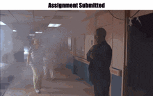 a man in a suit stands in a hallway with the words assignment submitted on the bottom
