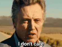 a man in a suit and tie says i don t care