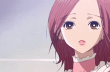 a girl with pink hair is wearing a pink top