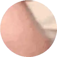 a close up of a person 's face in a circle with a white background