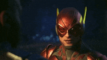 a man in a red superhero costume looks at another man