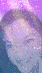 a close up of a woman 's face with the word mon written above her