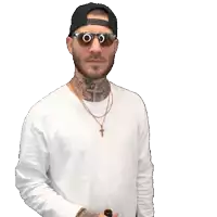 a man wearing sunglasses and a hat is holding a bottle of beer with a label that says lief
