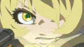 a close up of a person 's face with a gun in her hand .