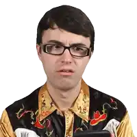 a man wearing glasses and a cowboy shirt holds a cellphone