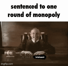 a black and white photo of a judge sitting at a desk