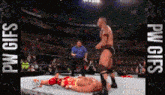 a wrestling match with the words pw gifs in the corner