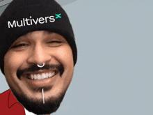 a man with a beard wearing a beanie that says multivers x