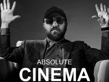 a black and white photo of a man with the words absolute cinema