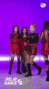 a group of girls are dancing in front of a purple background that says relay dance on it