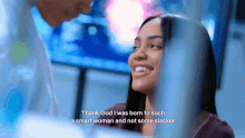 a woman is smiling with the words thank god i was born to such a smart woman and not some slacker on the bottom