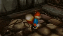 a close up of a video game character laying on a rocky surface .