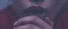a close up of a woman 's face with a bloody nose