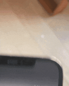 a close up of a phone screen with a few dots on it
