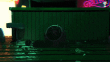 a neon sign that says grill on it is lit up