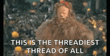 a blurry picture of a lion with the words `` this is the threadiest thread of all '' written on it .