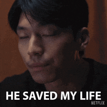 a close up of a man 's face with the words he saved my life on the bottom