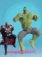 a hulk and thor are dancing together in a tik tok video