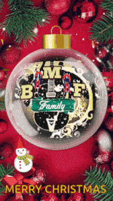 a merry christmas greeting card with a clear christmas ornament