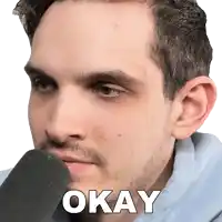 a close up of a man 's face with the word okay on the bottom