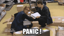 two people in a store with the word panic written on the bottom