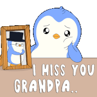 a penguin is looking at a picture of his grandpa