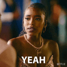 a woman wearing a necklace and earrings says yeah on a netflix ad