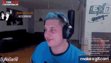 a man with blue hair is wearing headphones in front of a sign that says leva