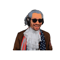 a man with a beard wearing sunglasses and headphones has an american flag around his neck