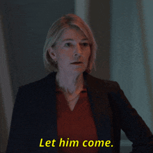 a woman in a suit says let him come in yellow letters