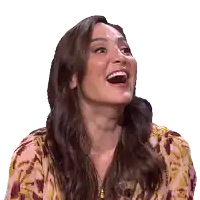 a woman in a leopard print shirt is laughing with her mouth wide open