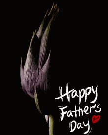 a black background with a purple flower and the words happy fathers day