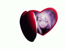 a red heart shaped item with a picture of a girl on it