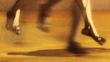 a person 's feet are shown in a blurry photo