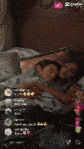 a man and a woman are laying on a bed with a caption that says " live "