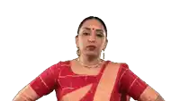 a woman in a red and gold dress is giving a thumbs down