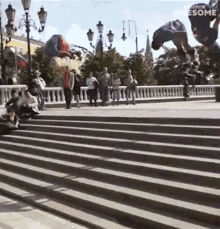 a man is doing a trick on a set of stairs and the words awesome are on the bottom