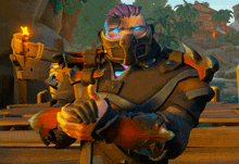 a video game character with a mask on his face is holding a torch