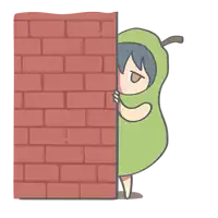 a person in a pear costume is peeking out from behind a brick wall