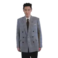 a man in a suit has his arms outstretched in front of a white background