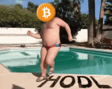 a man in a bathing suit is jumping into a pool with a bitcoin sign on his head