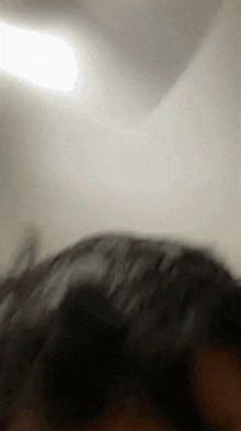 a blurry picture of a person laying on their back