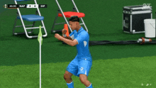 a soccer player wearing a blue shirt with msc on the front