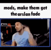 a man is sitting in front of a computer screen with the words `` mods , make them get the arslan fade ''