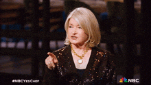 a woman in a sequined top is on nbc 's show