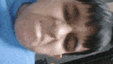 a close up of a person 's face making a funny face